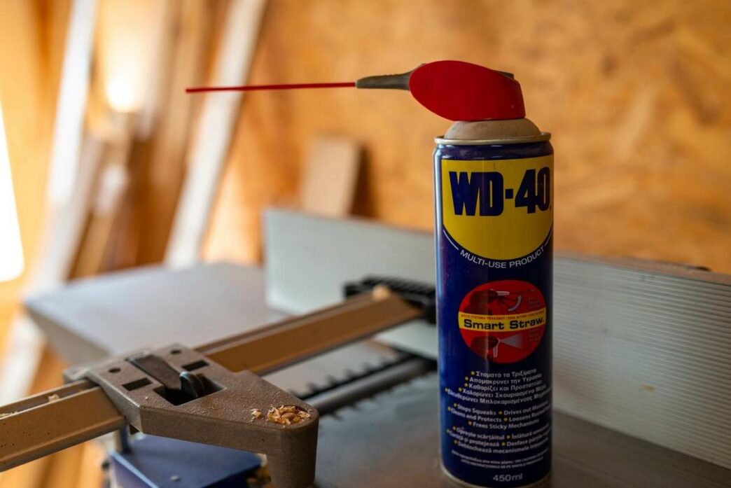 A vibrant kitchen scene showcasing various uses of WD-40 on everyday household items.