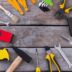 Sunlit garage workshop with essential tools, inviting workbench, and plants for warmth.